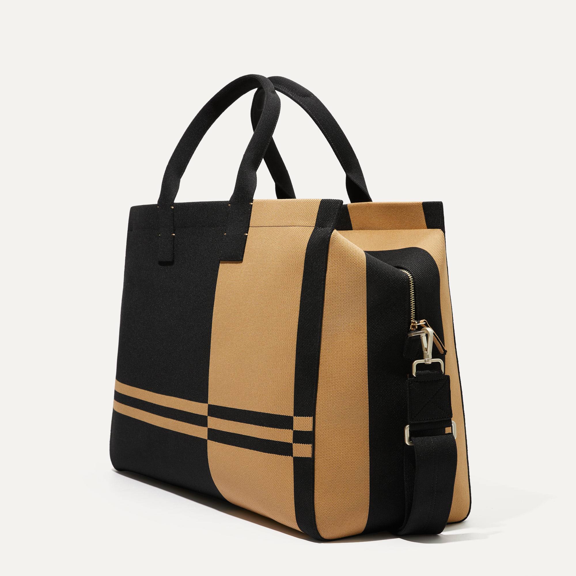 The Weekender in Camel and Black shown in diagonal view.