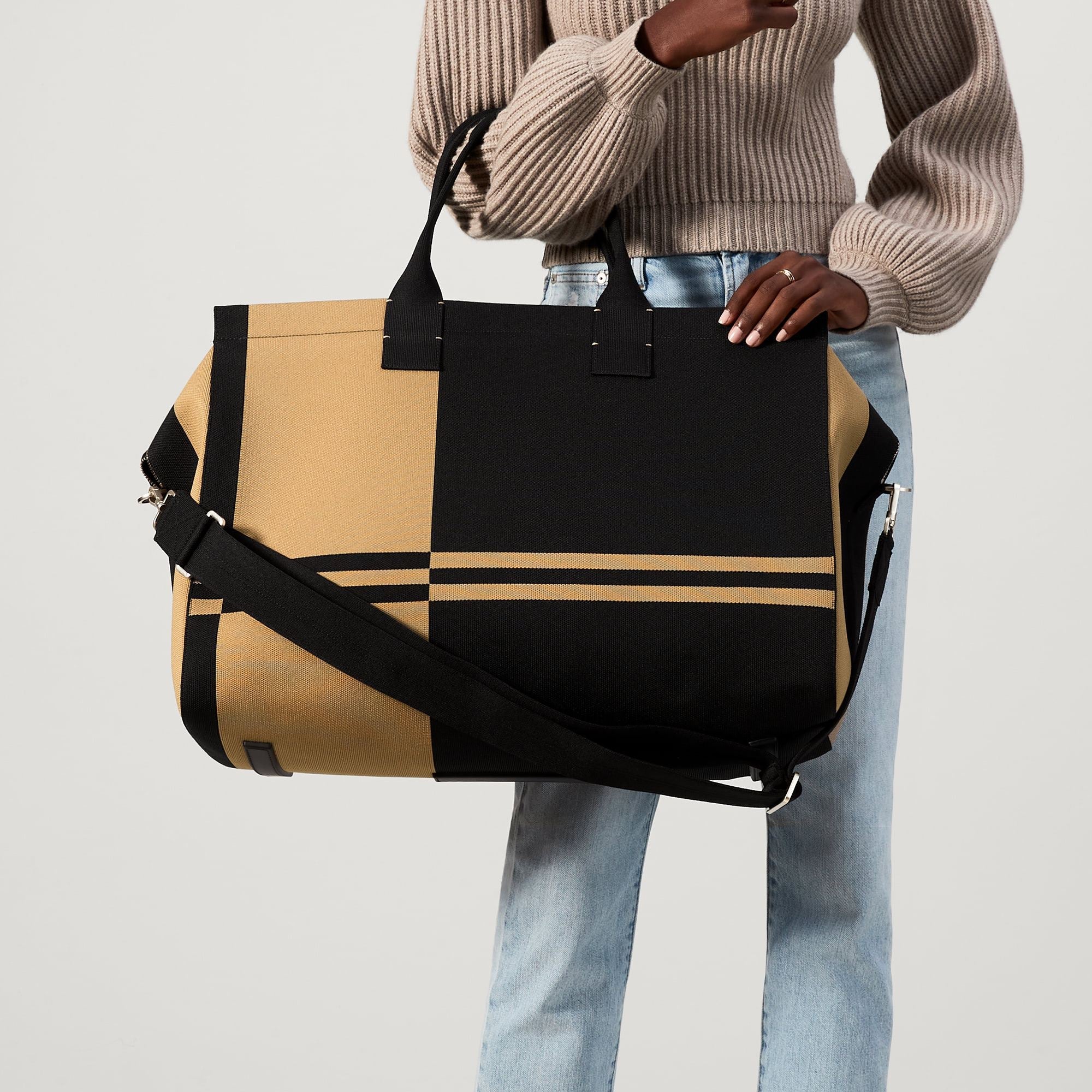 hover | The Weekender in Camel and Black shown on model.