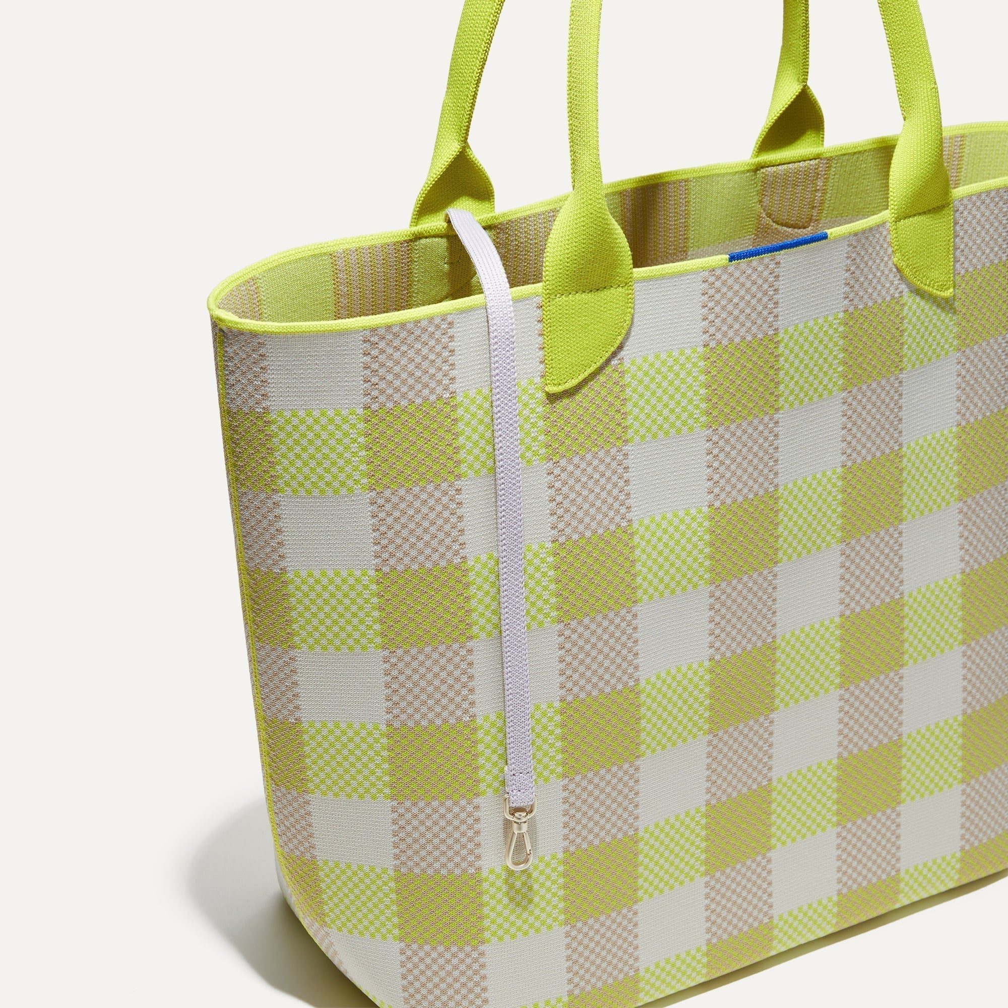 The Lightweight Tote in Citrus Gingham shown with its handy key leash.