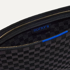 The Wristlet in Black Sand interior view with Rothy's halo detail.