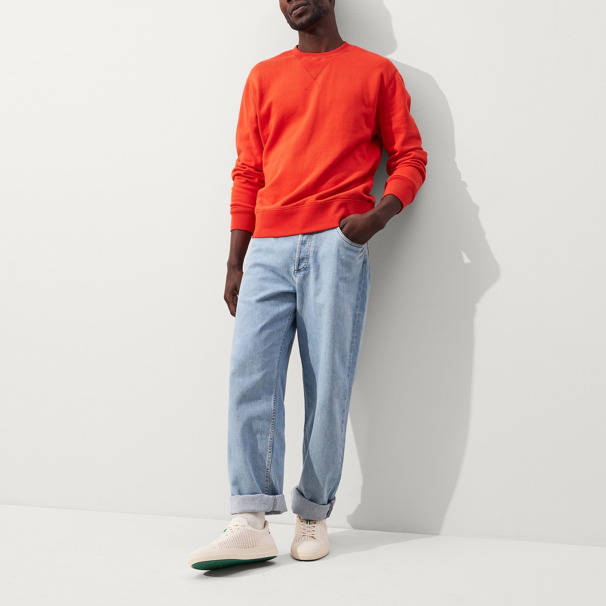 Alternate view of a model wearing The RS02 Sneaker in Courtside White.