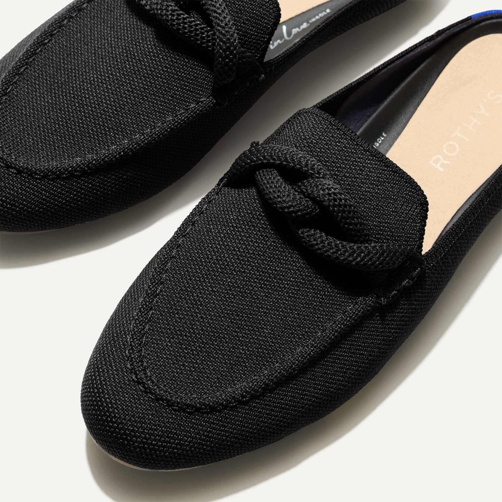 Close up of the toe and vamp of The Loafer Mule in Black.