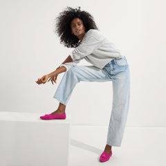 Alternate view of a model wearing The Almond Tassel Loafer in Pink Bramble.