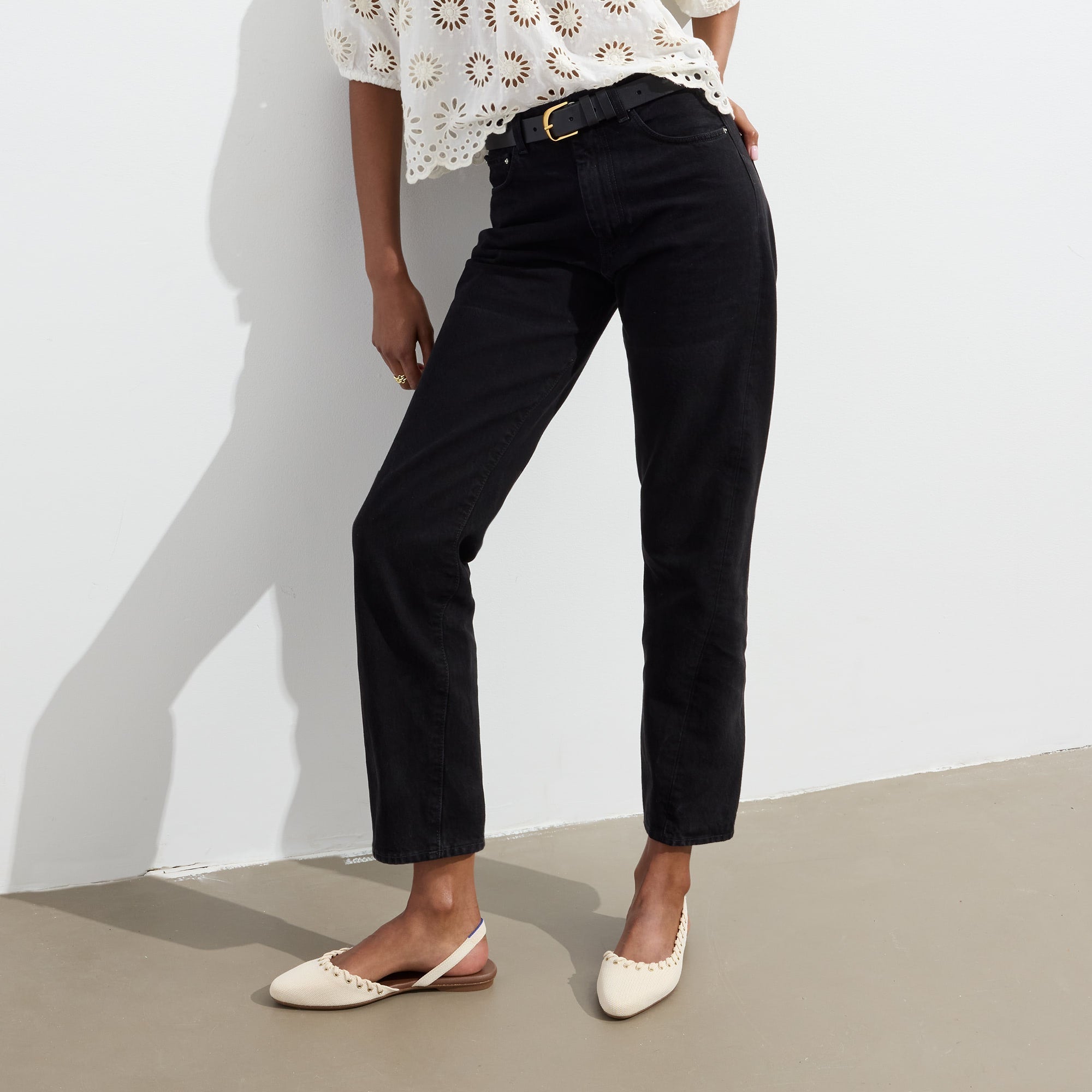 hover | Model wearing The Almond Slingback in Eyelet Ivory.