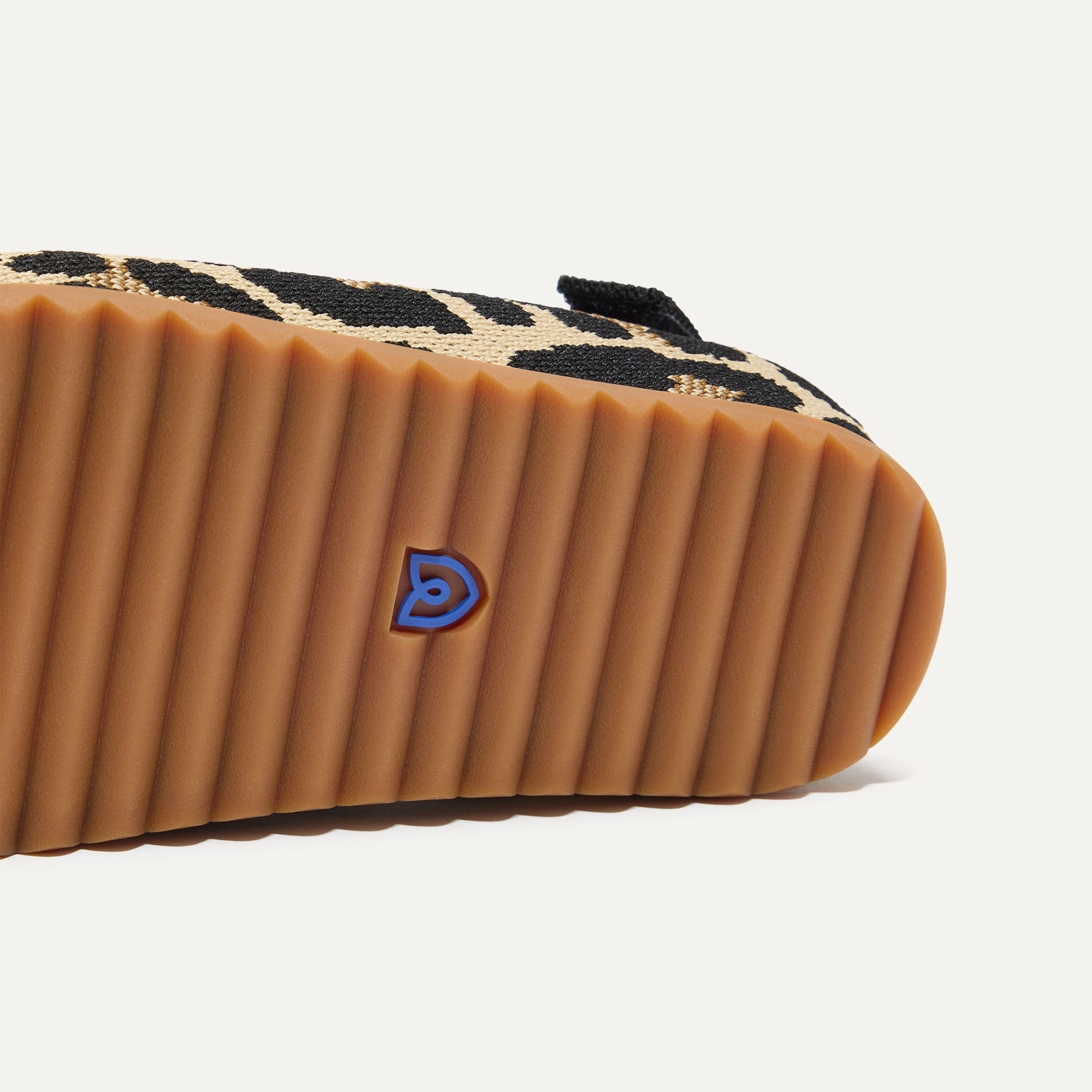 The sole of The Kids Clog in Desert Cat.