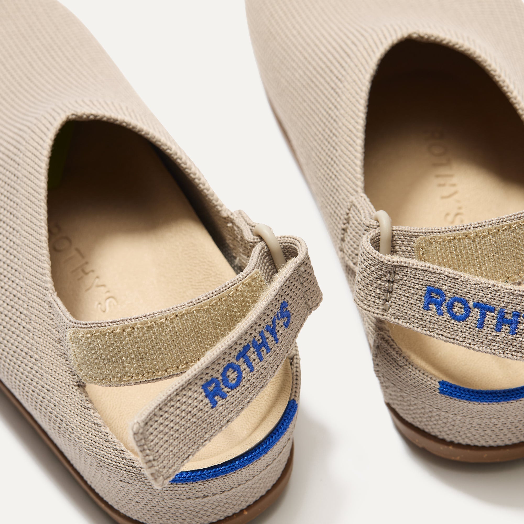 Close up of the back heel strap of The Kids Clog in Dove.